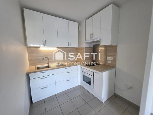 Appartement 47 m² avec Terrasse et Parking Privé