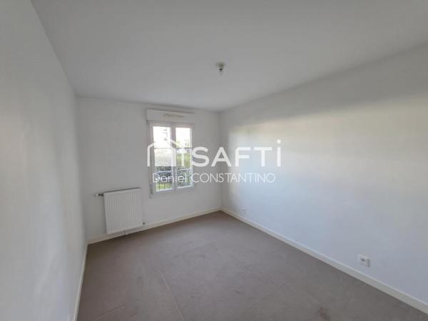 Appartement 47 m² avec Terrasse et Parking Privé