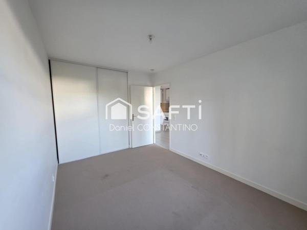 Appartement 47 m² avec Terrasse et Parking Privé