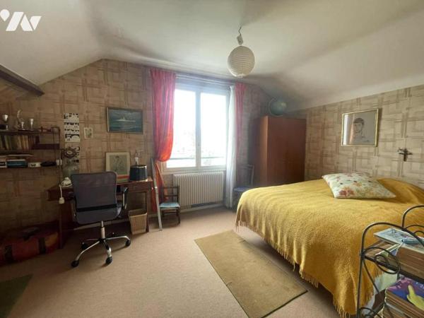 Maison quatre chambres, garage et jardin