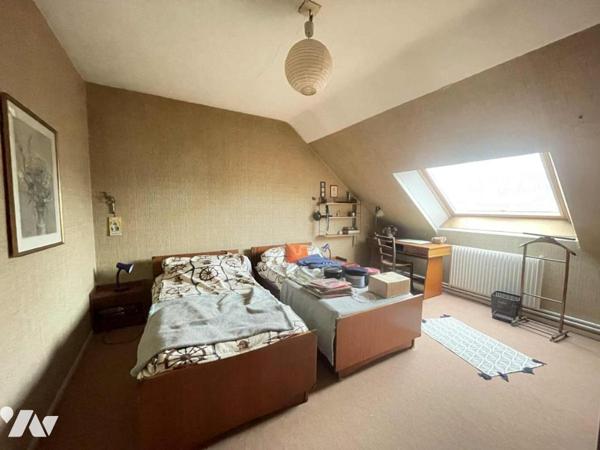 Maison quatre chambres, garage et jardin