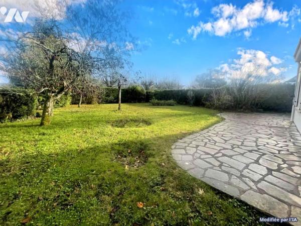 Maison quatre chambres, garage et jardin