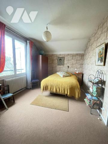 Maison quatre chambres, garage et jardin