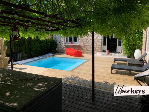 Maison 127m² avec piscine, jardin, terrasse, sous-sol et double parking à Gagny