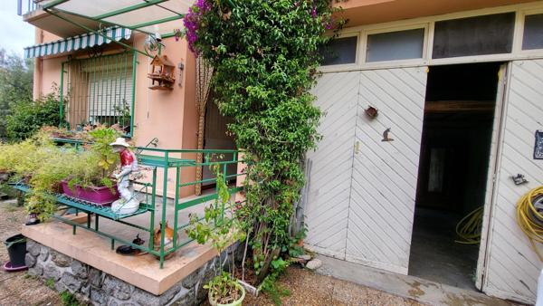 Maison de ville avec garage et jardin