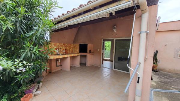 Maison de ville avec garage et jardin
