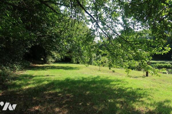 AU COEUR DE POUZAUGES, MAISON DE 1990 DISPOSANT DE 4 CHAMBRES, SUR UN TERRAIN DE 3200 m².