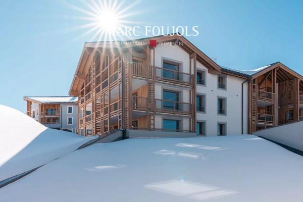 Appartement 2 Chambres + Cabine à l’Alpe d’Huez – Vue Panoramique et Services Haut de Gamme.
