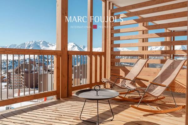 Appartement 2 Chambres + Cabine à l’Alpe d’Huez – Vue Panoramique et Services Haut de Gamme.