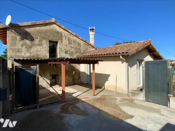 Maison avec garage et jardin potentiel 73m²