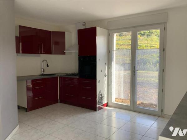 Maison avec garage et jardin potentiel 73m²