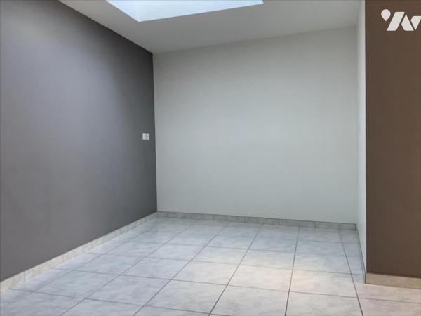 Maison avec garage et jardin potentiel 73m²