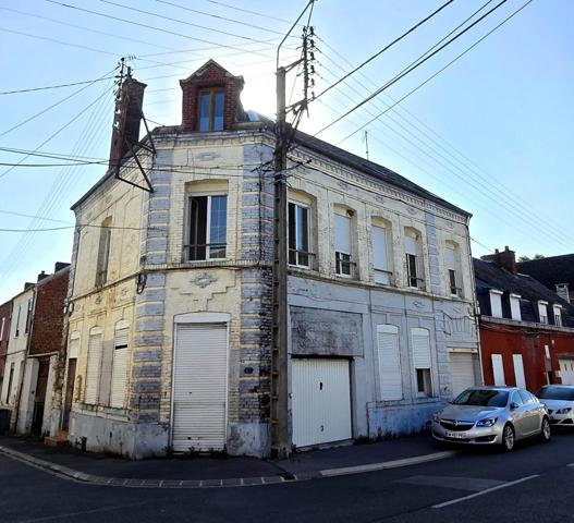 Immeuble de rapport de 3 logements + garage