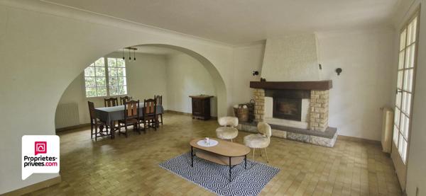 Maison de plain-pied de 120m² - 3 chambres - Garage - Dépendances - Terrain arboré de 2070m²