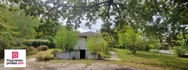 Maison de plain-pied de 120m² - 3 chambres - Garage - Dépendances - Terrain arboré de 2070m²