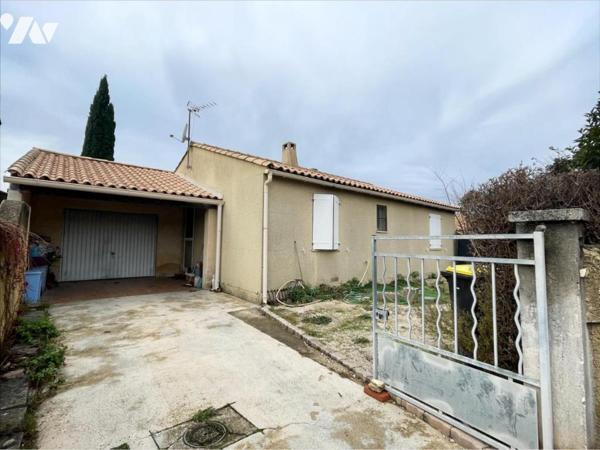 MAISON INDIVIDUELLE  AVEC GARAGE et jardin au calme