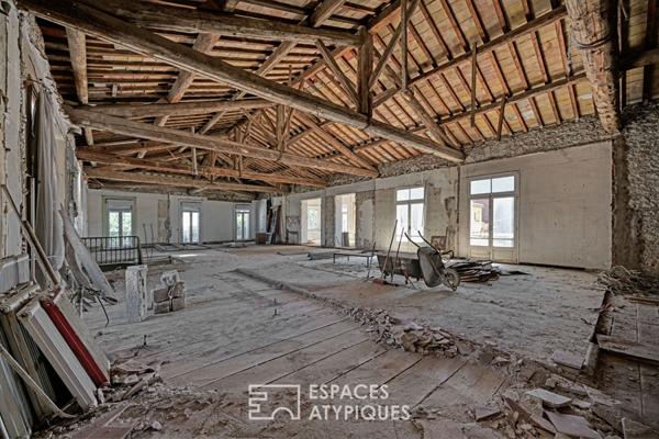 Loft brut à aménager 580 m² sur deux niveaux avec jardin de 700 m² à deux pas de la plage