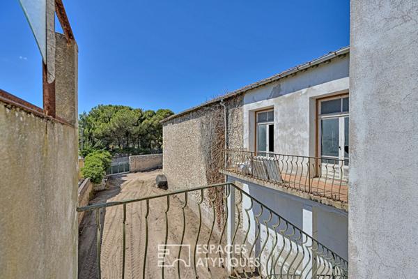 Loft brut à aménager 580 m² sur deux niveaux avec jardin de 700 m² à deux pas de la plage