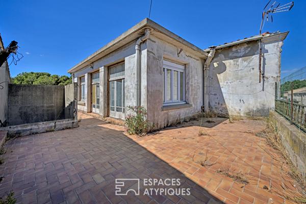 Loft brut à aménager 580 m² sur deux niveaux avec jardin de 700 m² à deux pas de la plage