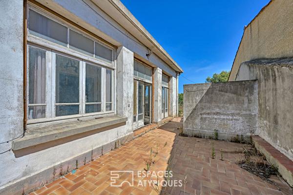 Loft brut à aménager 580 m² sur deux niveaux avec jardin de 700 m² à deux pas de la plage