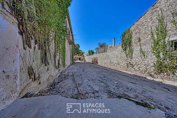Loft brut à aménager 580 m² sur deux niveaux avec jardin de 700 m² à deux pas de la plage