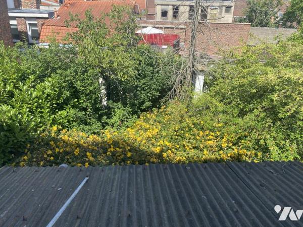 A VENDRE MAISON AVEC JARDIN ET GARAGE PRES DU PARC BARBIEUX A ROUBAIX