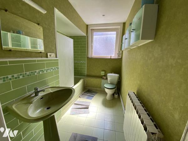 A VENDRE MAISON AVEC JARDIN ET GARAGE PRES DU PARC BARBIEUX A ROUBAIX