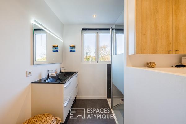 Maison de ville rénovée entre volumes et prestations soignées