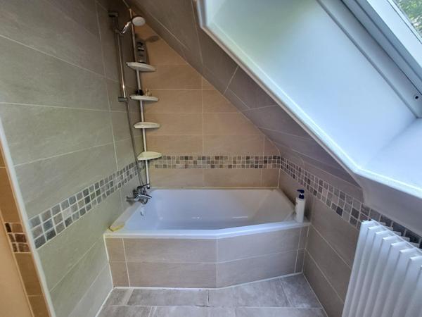 Maison familiale sur terrain arboré en centre ville