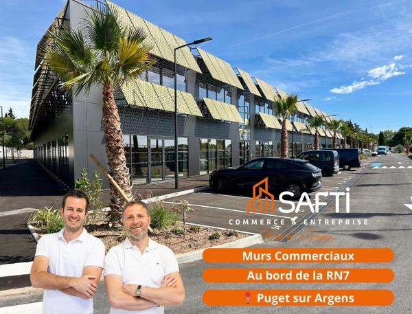 Murs commerciaux 290m² vendus brut avec 10 places de parking privatives au bord de la RN7