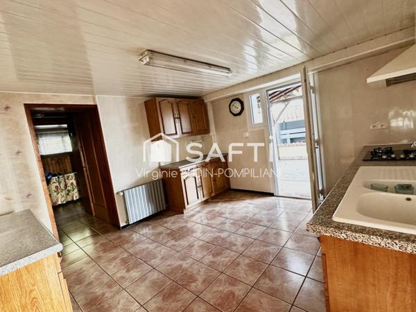 MAISON INDIVIDUELLE PLAIN PIEDS 3 CHAMBRES  SUR SOUS-SOL COMPLET AVEC GARAGE CUISINE D'ETE