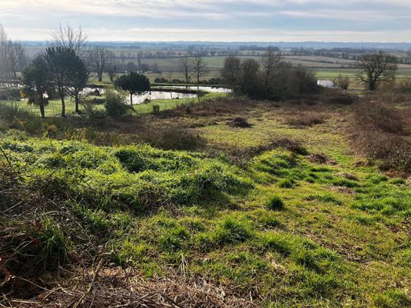 Terrain constructible de 2069 m² en campagne