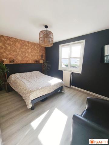 Maison 88 m² avec jardin, garage et parking.