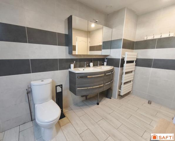 Maison 88 m² avec jardin, garage et parking.