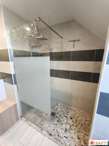 Maison 88 m² avec jardin, garage et parking.