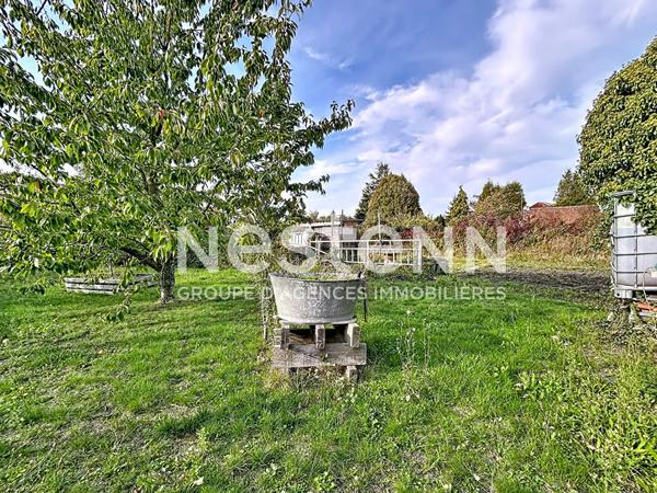 Maison Semi individuelle semi plain pied 136m² avec 3 chambres dont deux à rénover, Jardin, Terrain constructible non attenant