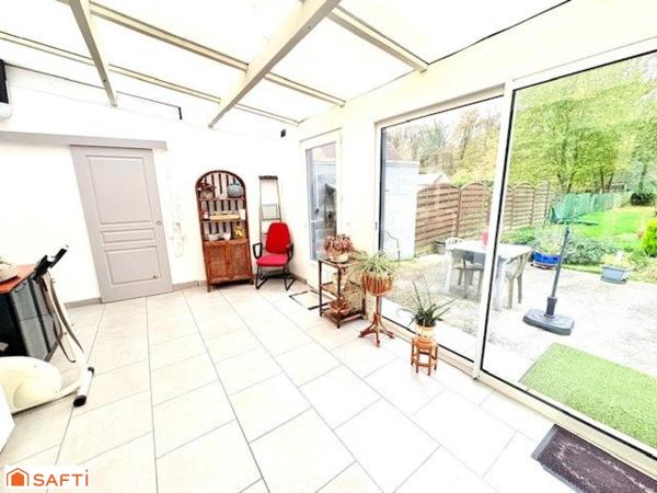 Maison semi individuelle à Raismes– Parcelle de 400 m²- véranda-  4 chambres