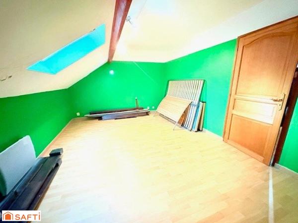 Maison semi individuelle à Raismes– Parcelle de 400 m²- véranda-  4 chambres