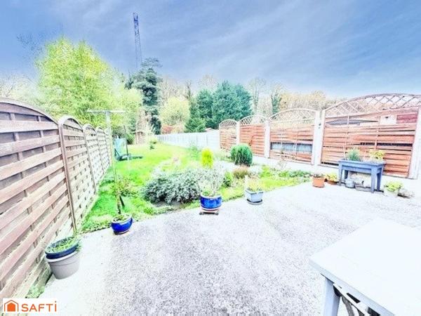 Maison semi individuelle à Raismes– Parcelle de 400 m²- véranda-  4 chambres