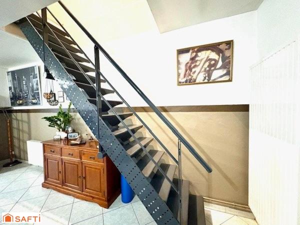 Maison semi individuelle à Raismes– Parcelle de 400 m²- véranda-  4 chambres