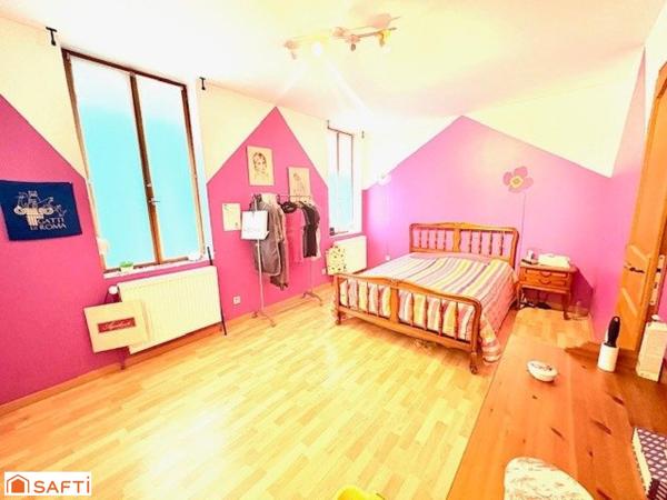 Maison semi individuelle à Raismes– Parcelle de 400 m²- véranda-  4 chambres