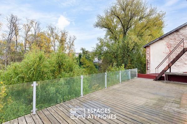 Ancien bâtiment industriel réhabilité de près de 900m2