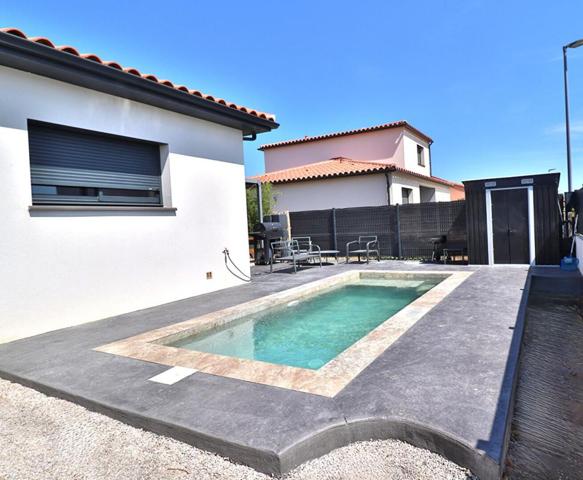 Villa  4 pièce(s) 102 m2 sur un terrain de 336m² avec piscine