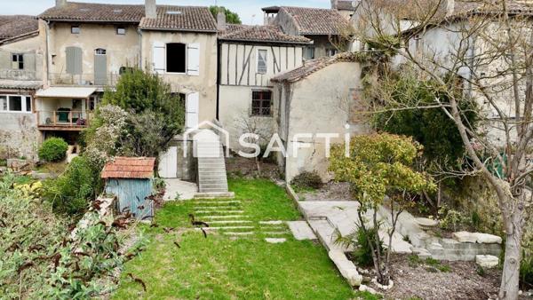 Maison de ville rénovée 135m² – 4 niveaux – Centre de Mézin – Jardin 300m² – Dépendance