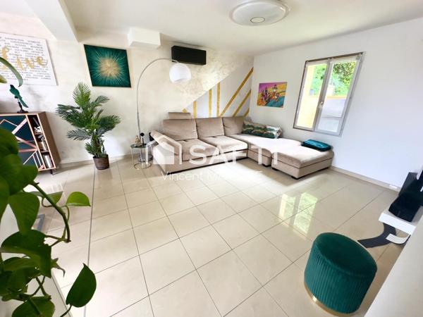 Maison familiale avec jardin, garage et confort moderne