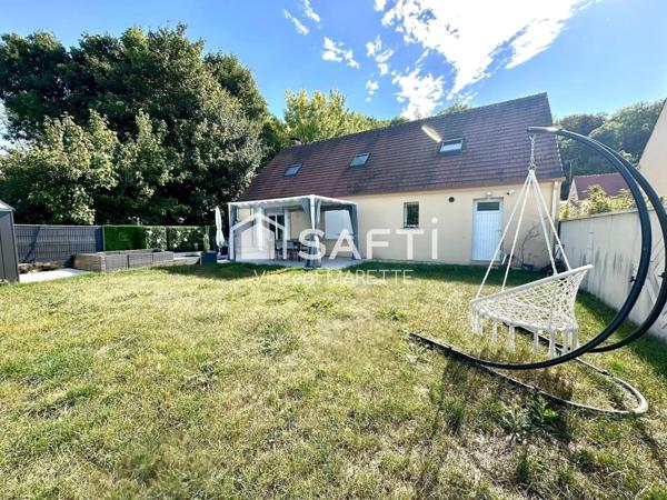Maison familiale avec jardin, garage et confort moderne