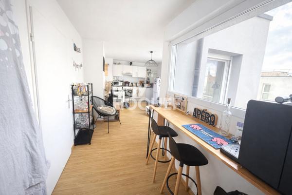 A VENDRE - Appartement type 3 avec ascenseur - 2 chambres - Balcon - Place de parking privative.