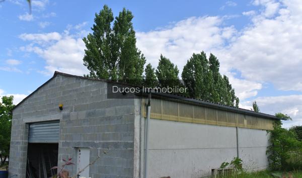 Maison avec un hangar de 100 m²