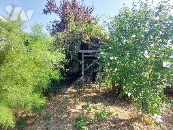 SAINT-GAUDENS, maison de ville sur trois niveaux avec jardin attenant, proche des commerces