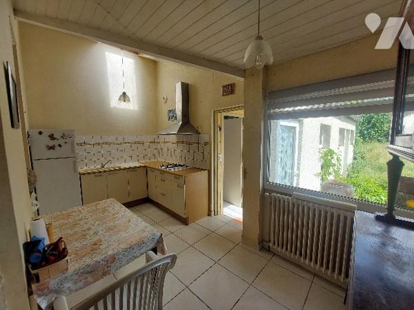 SAINT-GAUDENS, maison de ville sur trois niveaux avec jardin attenant, proche des commerces